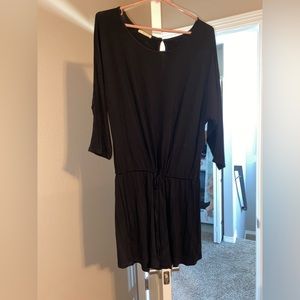Romper. Never worn. Very stretchy. Has a string around the waist to tie.